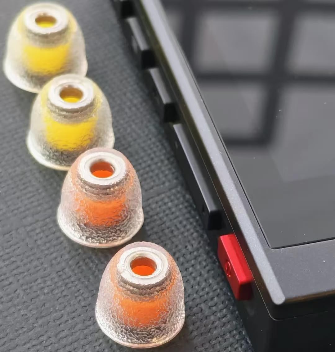 User wearing Tang Sancai Noble ear tips during workouts for sustained comfort.