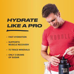 TB12 powder dissolving in water with refreshing lemonade flavor.