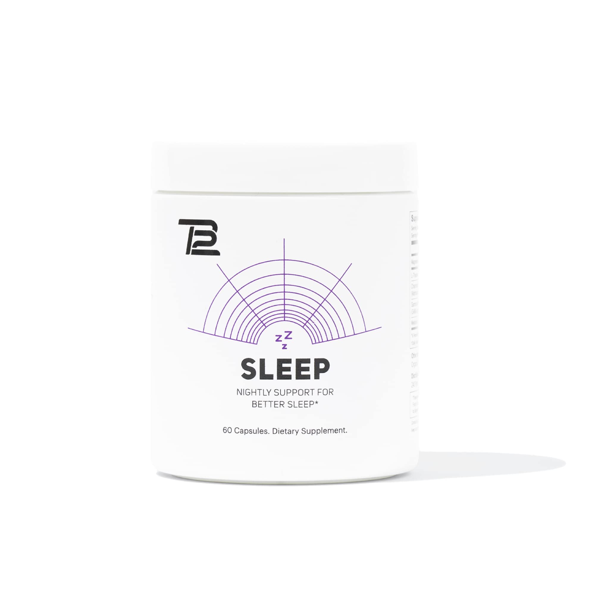 TB12 Sleep bottle on a nightstand promotes calm pre-bed routine.