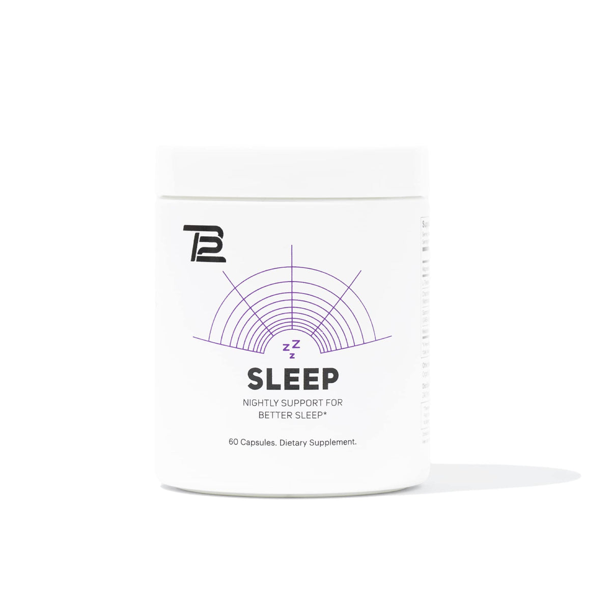 TB12 Sleep bottle on a nightstand promotes calm pre-bed routine.