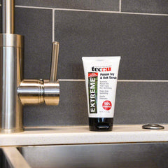 Pack of two Tecnu Extreme Poison Ivy & Oak Scrub bottles for rash management.