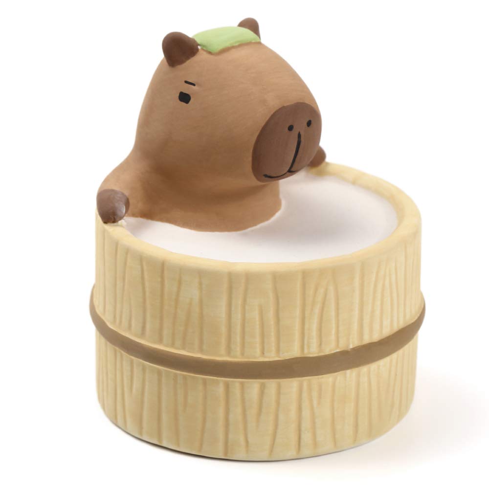 Terra Distribution aroma ceramic stone diffuser with bathing capybara design for portable aromatherapy.