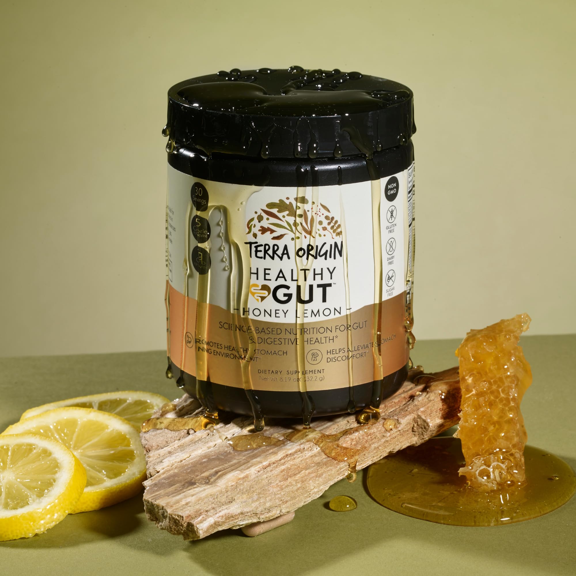 Terra Origin Healthy Gut Powder scoop dispensing a convenient daily serving.