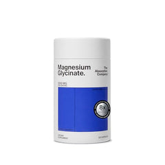 The Absorption Company magnesium glycinate capsules close-up, easy to swallow.