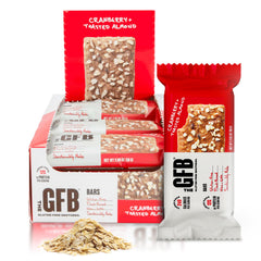 The GFB Cranberry Toasted Almond bar packaging highlights gluten-free vegan nutrition in a convenient, on-the-go format.