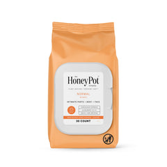 The Honey Pot Normal Feminine Wipes packaging shows a travel-ready resealable pack for on-the-go freshness.