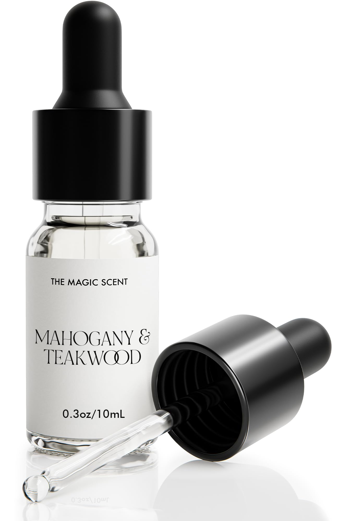 The Magic Scent Mahogany & Teakwood diffuser oil bottle highlighting premium scent notes for a refined room aroma.