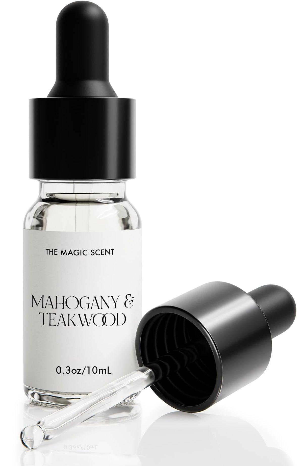 The Magic Scent Mahogany & Teakwood diffuser oil bottle highlighting premium scent notes for a refined room aroma.