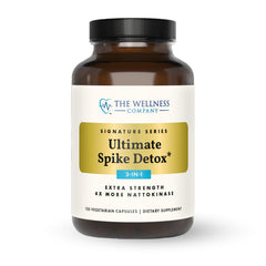 The Wellness Company Ultimate Spike Detox bottle closeup showing clear capsules for daily immune support