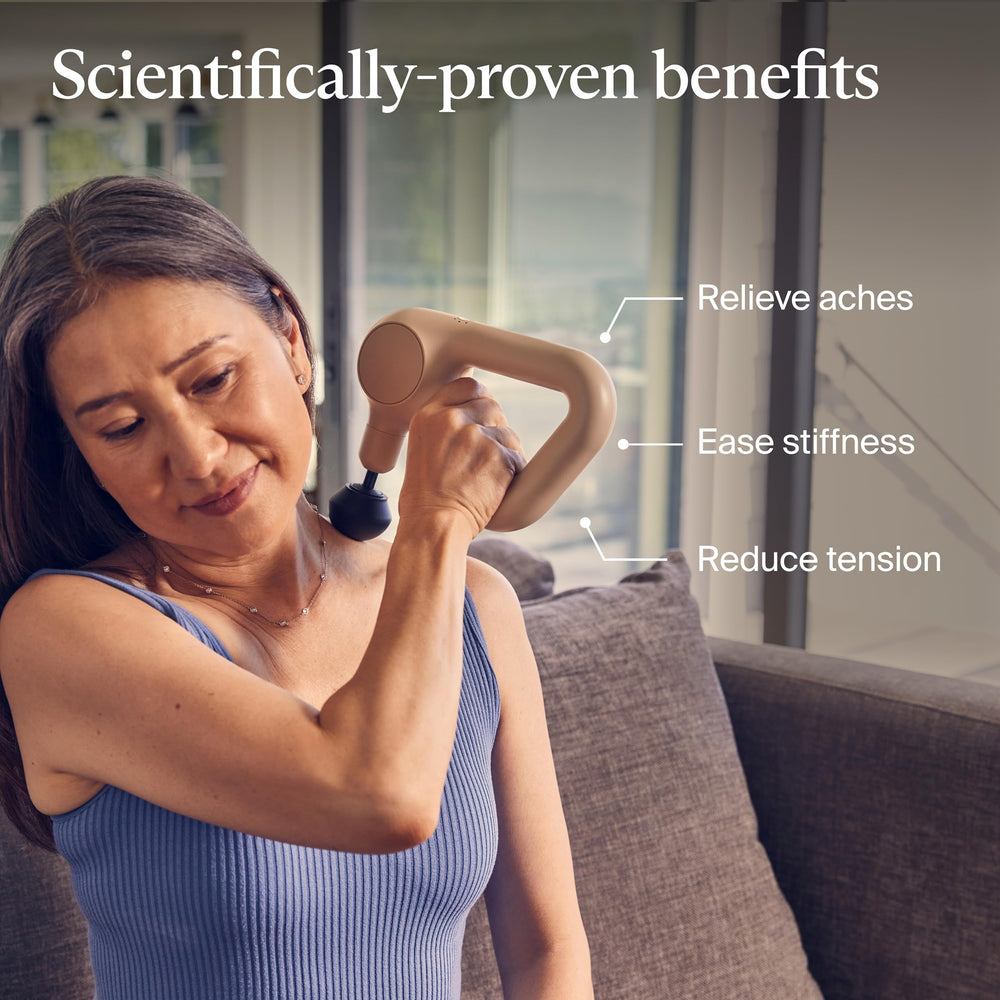 TheraGun Relief lightweight handheld unit for easy daily muscle relief.