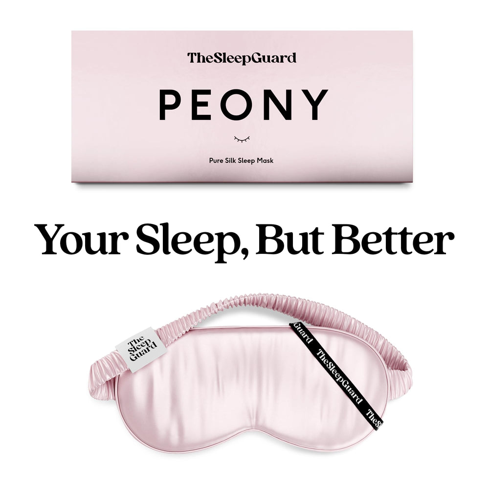 TheSleepGuard eye mask on the face in low light demonstrates coverage.