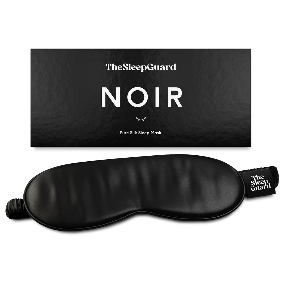 TheSleepGuard pure silk sleep mask in black blocks light for deeper rest