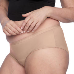 Thinx For All Leaks hip-hugger underwear beige on model shows everyday comfort.