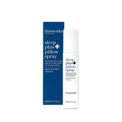 This Works Sleep Plus Pillow Spray bottle on nightstand promotes relaxation before sleep.