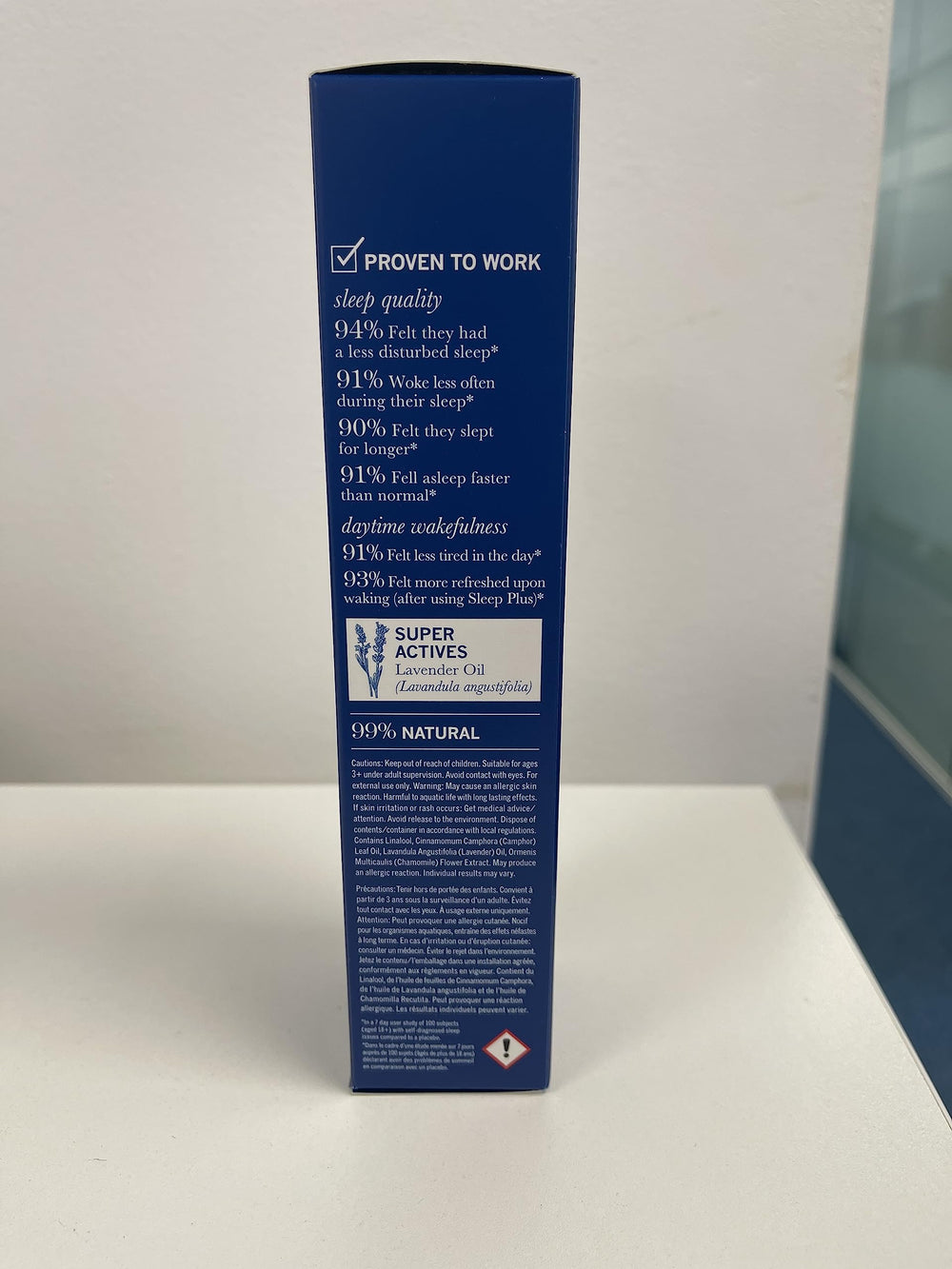 THISWORKS Sleep Plus Pillow Spray room scene with soft lighting aids sleep