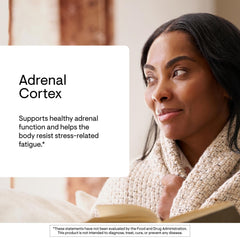 THORNE Adrenal Cortex capsules outside bottle for convenient daily use.