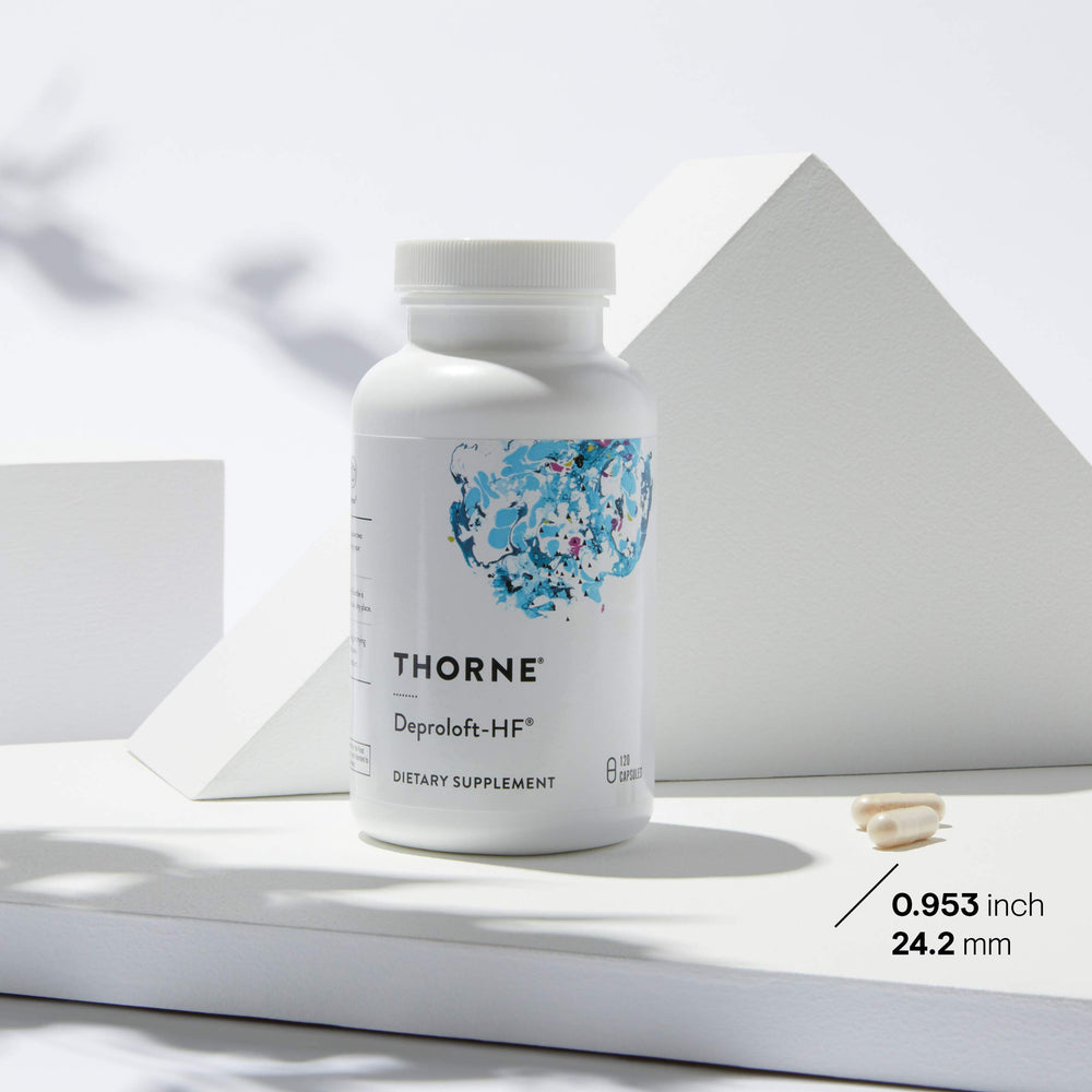 THORNE Emotion Balance bottle in hand suggesting portable daily balance.