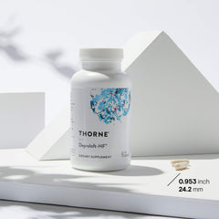 THORNE Emotion Balance bottle in hand suggesting portable daily balance.