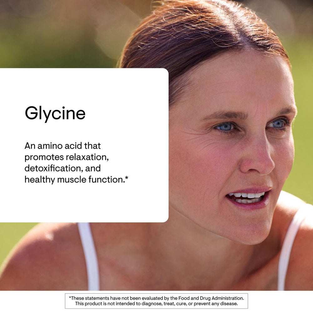 THORNE Glycine capsules in hand suggesting easy daily supplementation