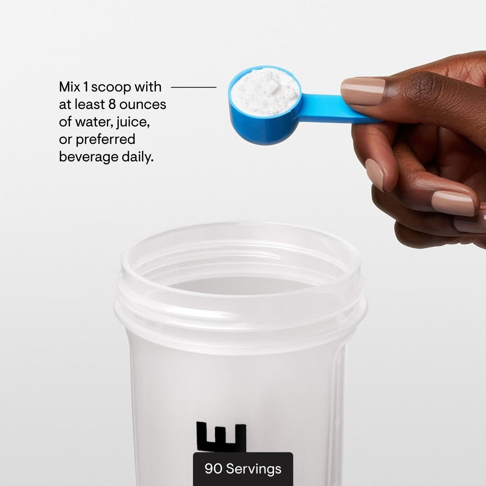 Measuring THORNE L-Glutamine powder portion for routine use.