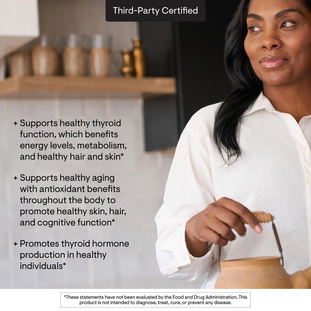 Thorne selenium packaging on desk demonstrates premium supplement quality.