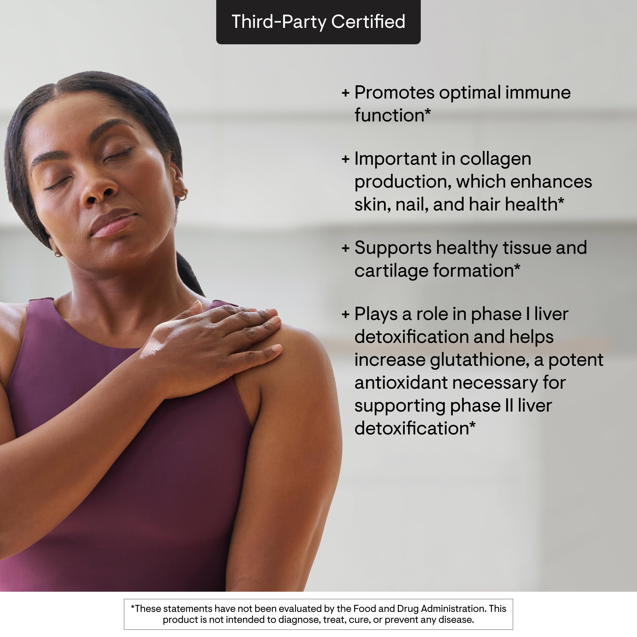 THORNE Vitamin C capsules in hand illustrating easy daily dosing.