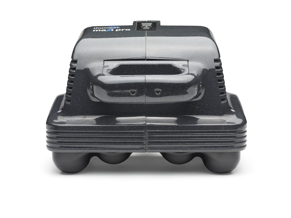 Thumper Maxi Pro massager in clinic setup demonstrates quick full-body coverage.