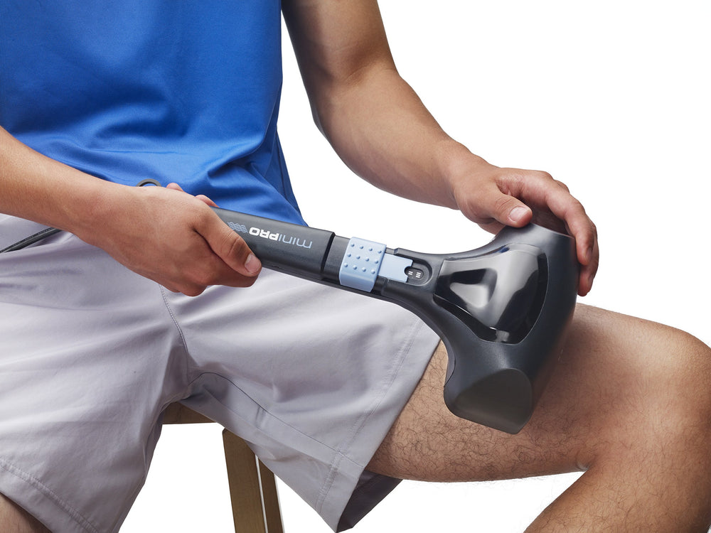 Thumper Mini Pro long-handle design for hard-to-reach areas