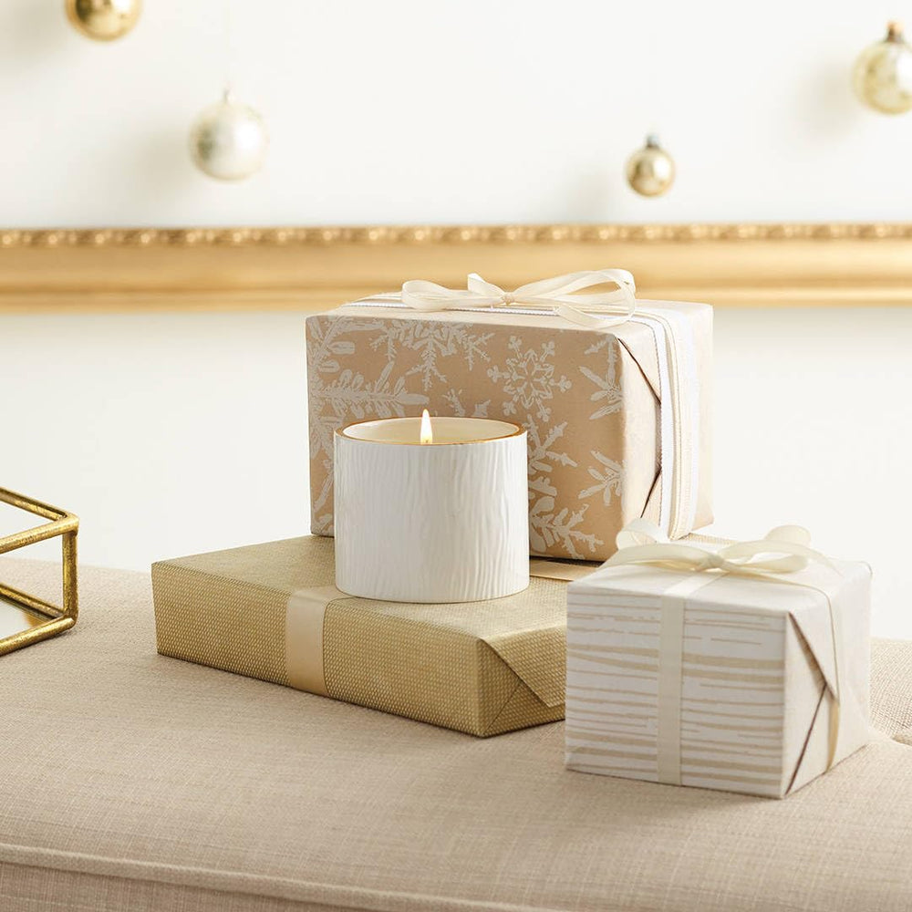 Thymes Frasier Fir candle with 24 karat gold rim adds festive luxury