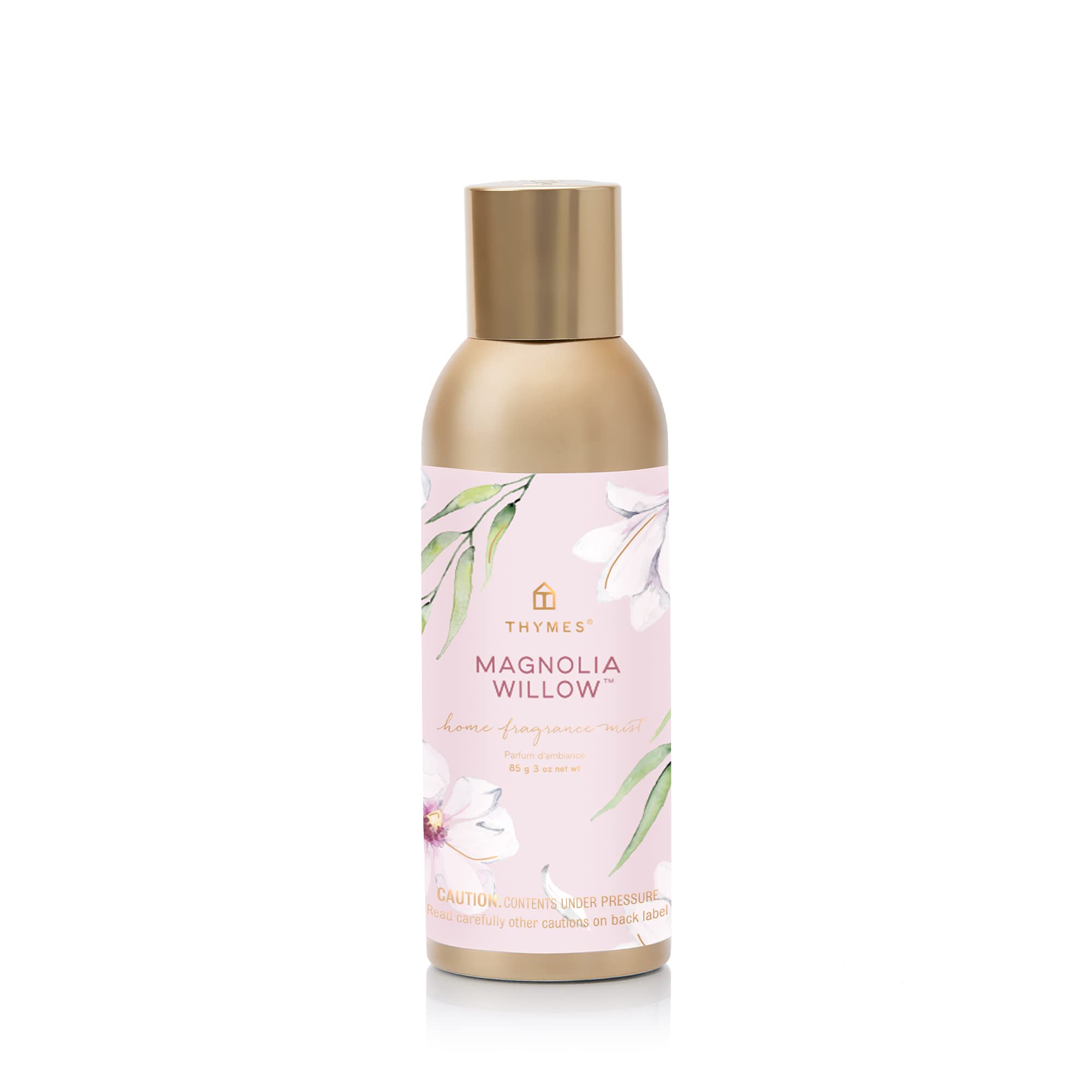 Thymes Magnolia Willow fragrance mist bottle refreshing a room.