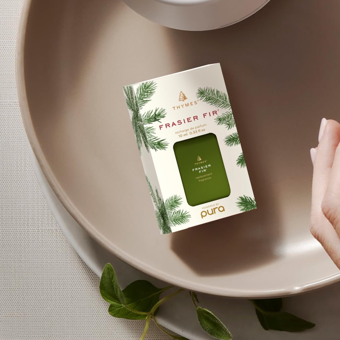 Thymes Pura 4 diffuser plugged into outlet for continuous fragrance.