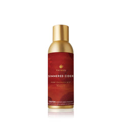Thymes Simmered Cider bottle pour offers inviting autumn aroma in home ambiance