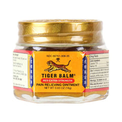 Tiger Balm ointment in use with warming relief on skin