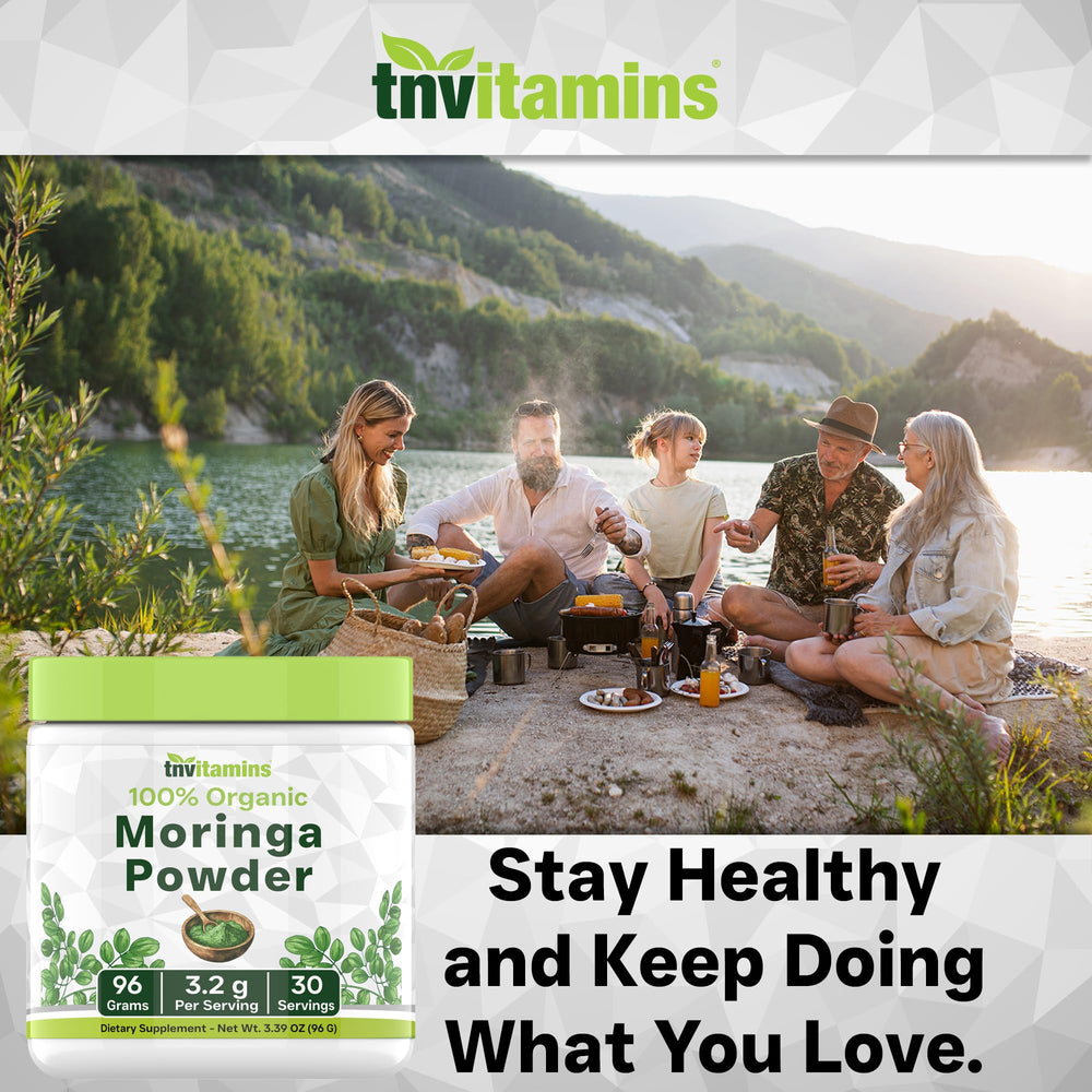 tnvitamins Organic Moringa Powder poured into a vibrant green smoothie