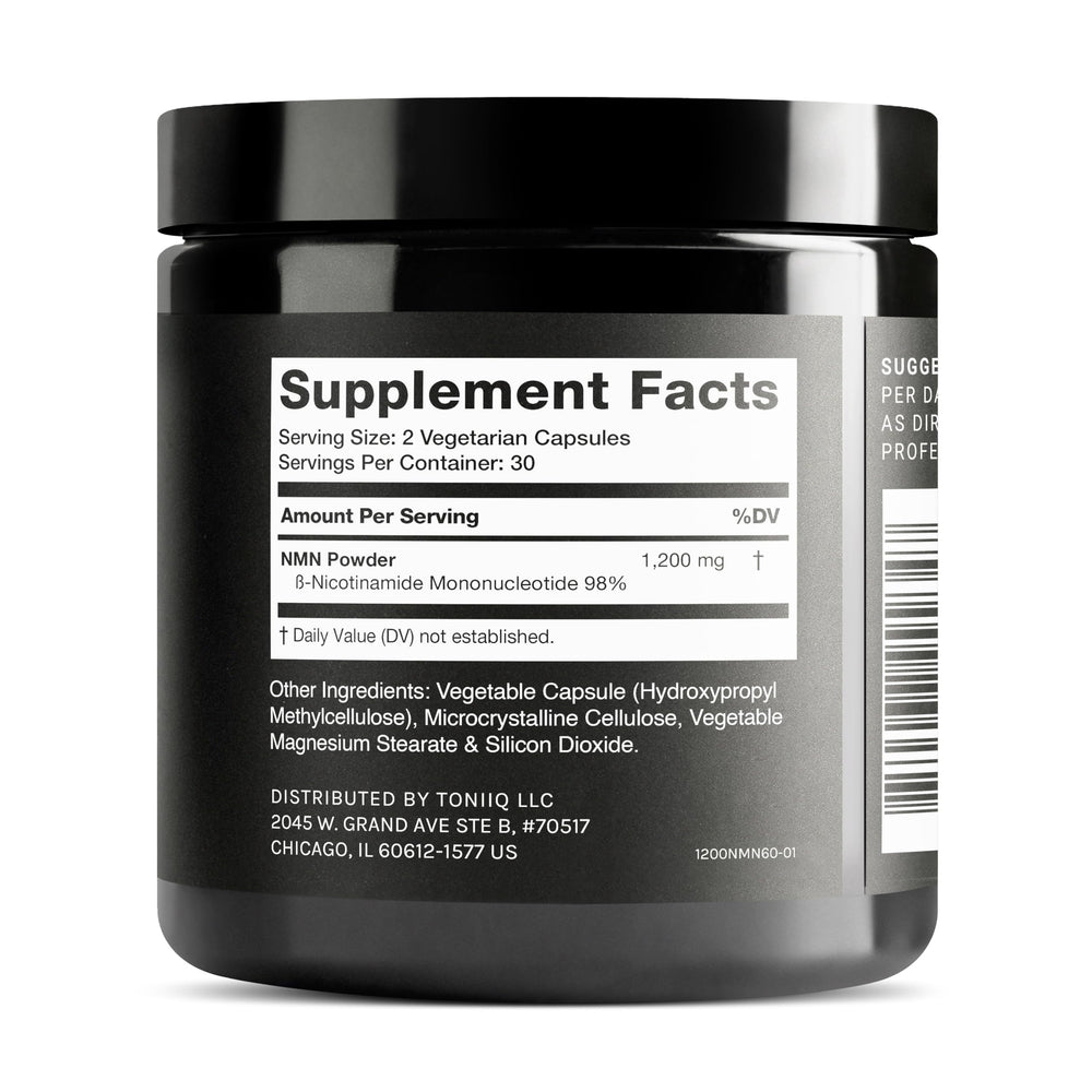 Toniiq NMN capsules in hand illustrating convenient daily supplementation.