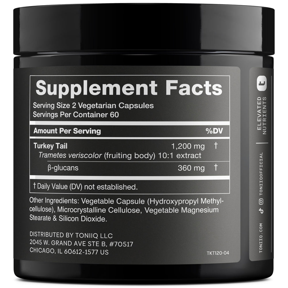 Toniiq Turkey Tail capsules beside water for simple daily use