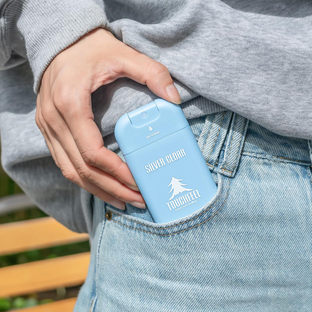 TouchFeel travel size bottle fits in hand Pocket or clutch for easy hygiene on the move
