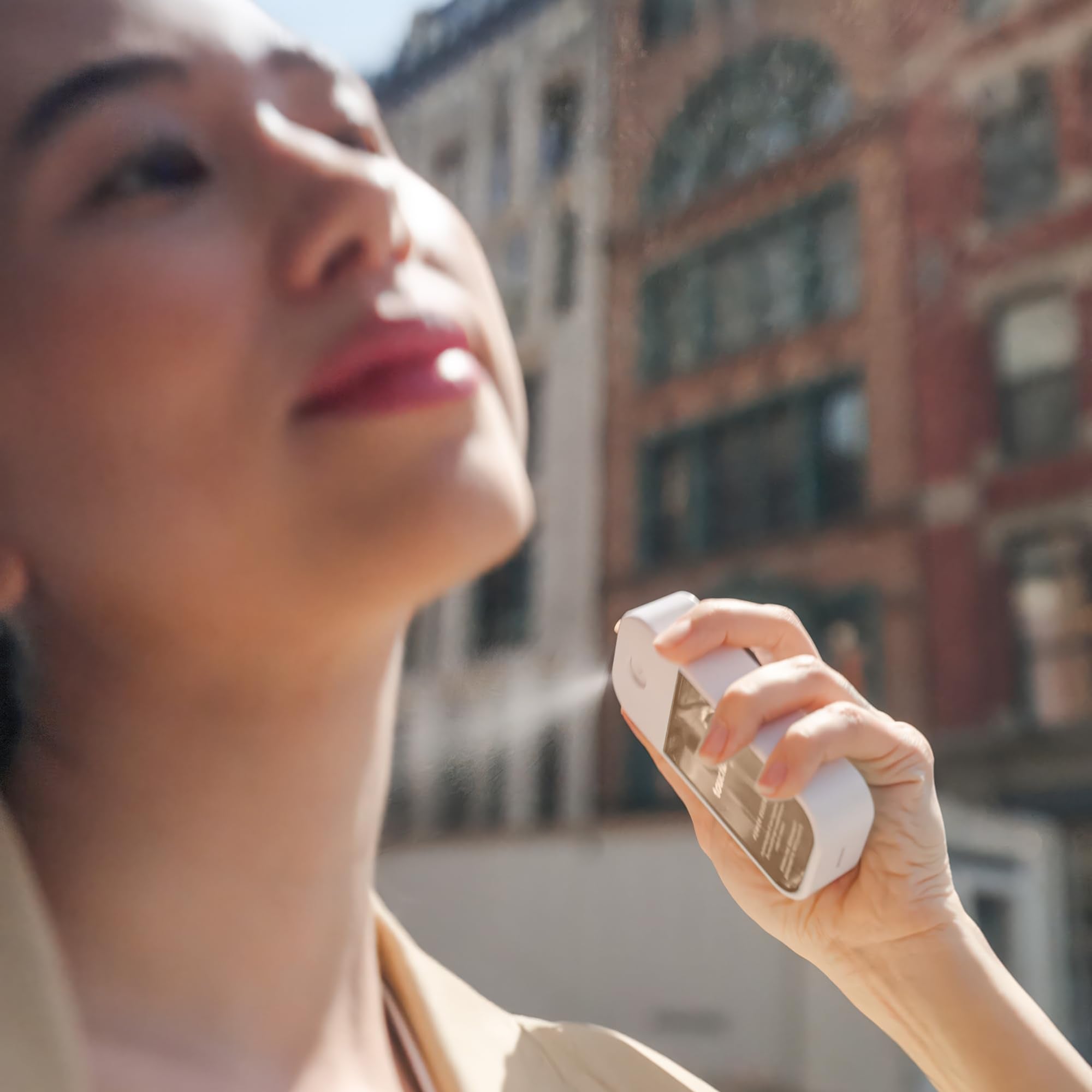 Touchland compact bottle highlights on-the-go care without bulk.