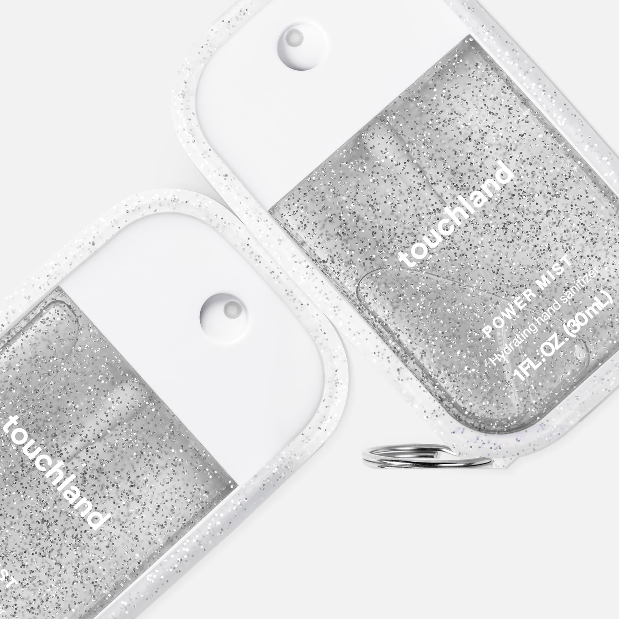 Touchland compact sanitizer spray shown as a pocket-friendly on-the-go option.