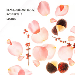 Touchland Glow Mist fragrance swirl suggests timeless rose notes during use.