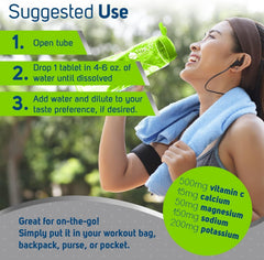 Athlete holding a cup of lemon-lime electrolyte drink for hydration on the go.