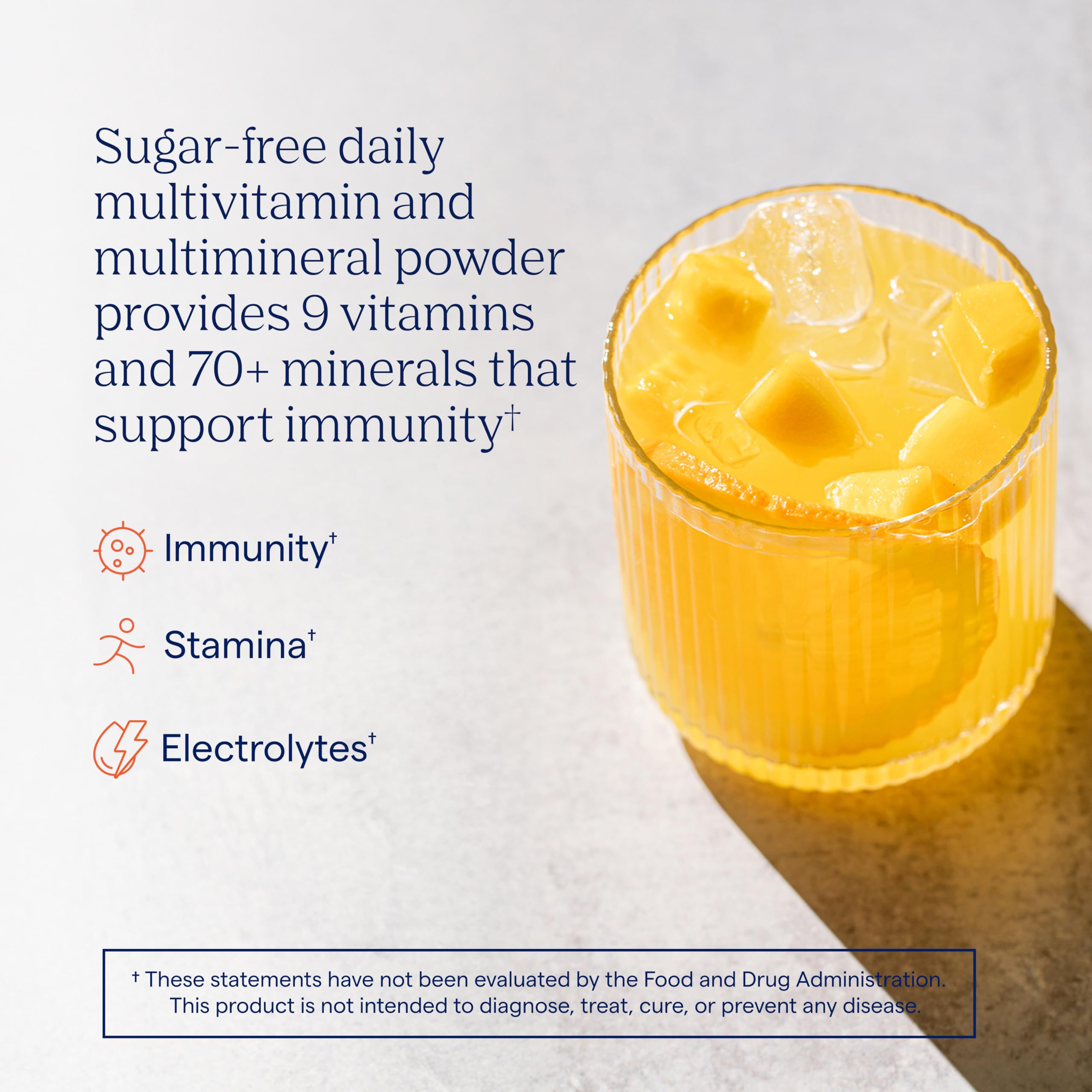 Trace Minerals Power Pak orange mango powder dissolving in water; quick hydration aid on busy days.