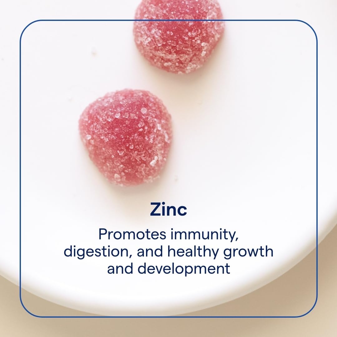 Trace Minerals Zinc Gummy gummies poured on a surface showing digestion support.
