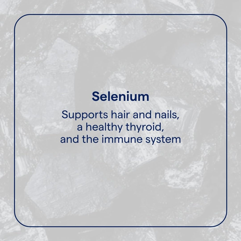 Close-up of metered dropper dispensing selenium solution for daily use