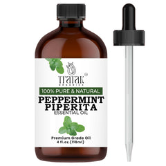 TRATAK ORGANICS Peppermint Piperita oil bottle pour promotes a refreshing diffuser experience.