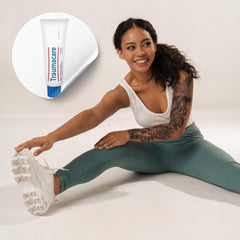 Hand applying Traumacare Cream illustrating simple daily use.