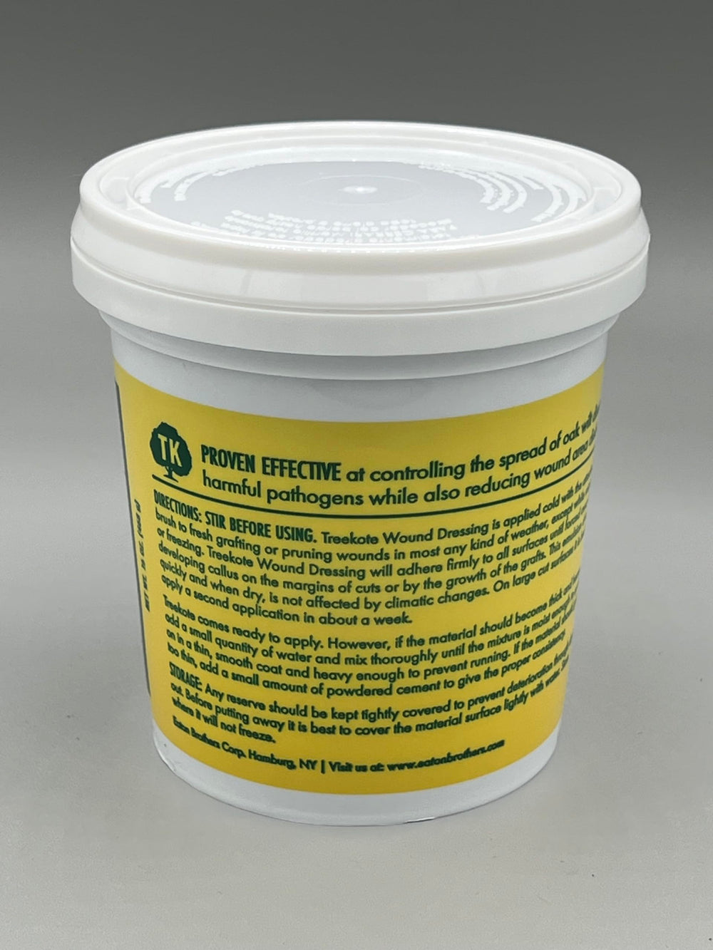 Treekote pruning sealer bottle closeup indicates convenient, ready-to-use care for trees.