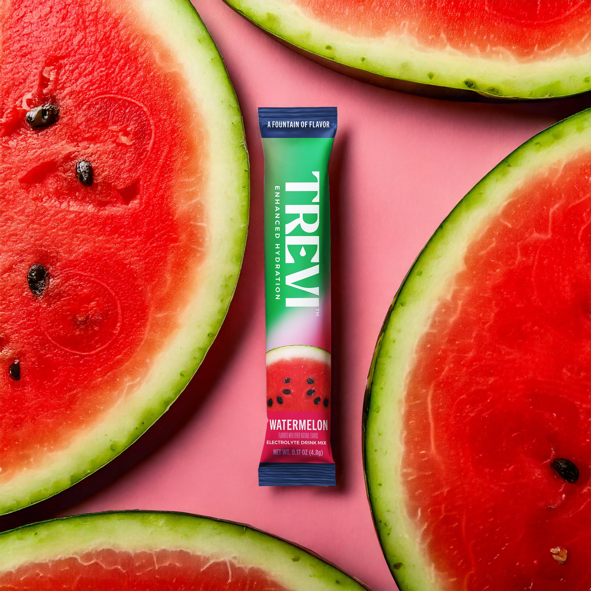 Glass of pink TREVI watermelon hydration showing zero sugar