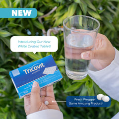Tricovit capsules being poured, suggesting easy daily routine.