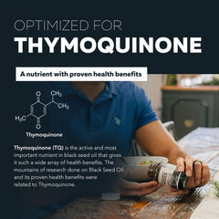 Triquetra Health black seed oil bottle label detail highlighting ingredients.